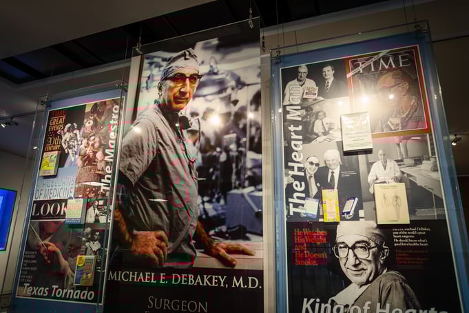 Several pictures of Dr. Michael DeBakey hang in the Baylor College of Medicine DeBakey museum in Houston, Texas.