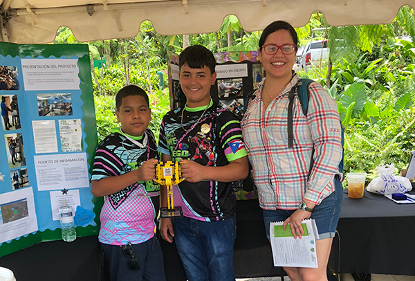 Eneilis and her FIRST LEGO League team