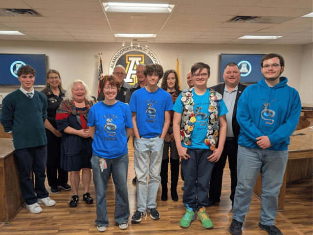 A.S.T.R.O. Vikings pose with board members following an Alamogordo Public Schools board meeting in January 2026.