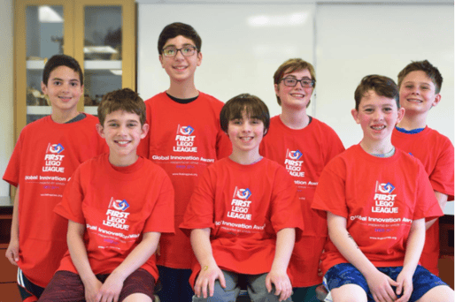 The Robohawks pose and smile at the Uruguay championship.