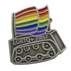 The FIRST Pride logo as a pin. There is a robot holding a Pride flag.