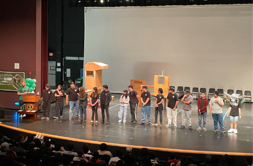 A group of people on a stage

AI-generated content may be incorrect.