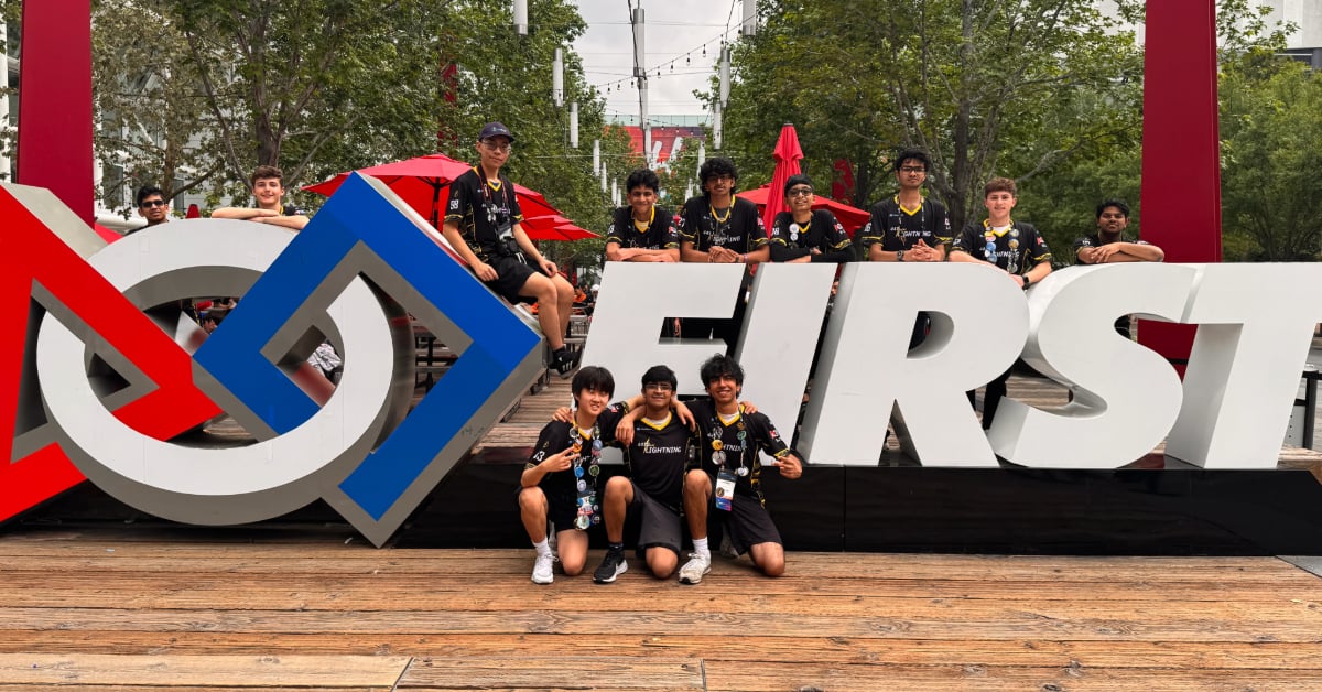 ARC Lightning poses for a photo in front of the George R. Brown Convention Center in Houston, Texas during the 2025 FIRST Championship 