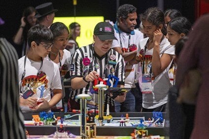 FIRST LEGO League team and referee